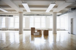 cardboard boxes in the centre of a room